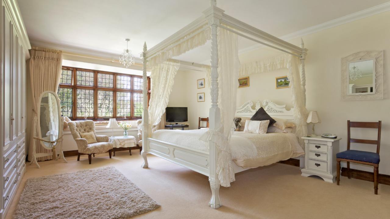 The Minimalist Steel Four-Poster Bed